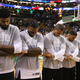 Members of the Boston Celtics link arms during the singing of the national anthem before the preseason game against the Brooklyn Nets at TD Garden on Oct. 17, 2016, in Boston. (Maddie Meyer/Getty Images)